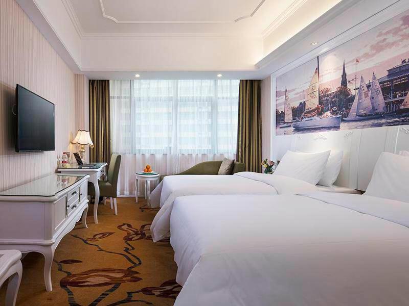 Vienna International Hotel Fenghua Zhongshan Road Buitenkant foto