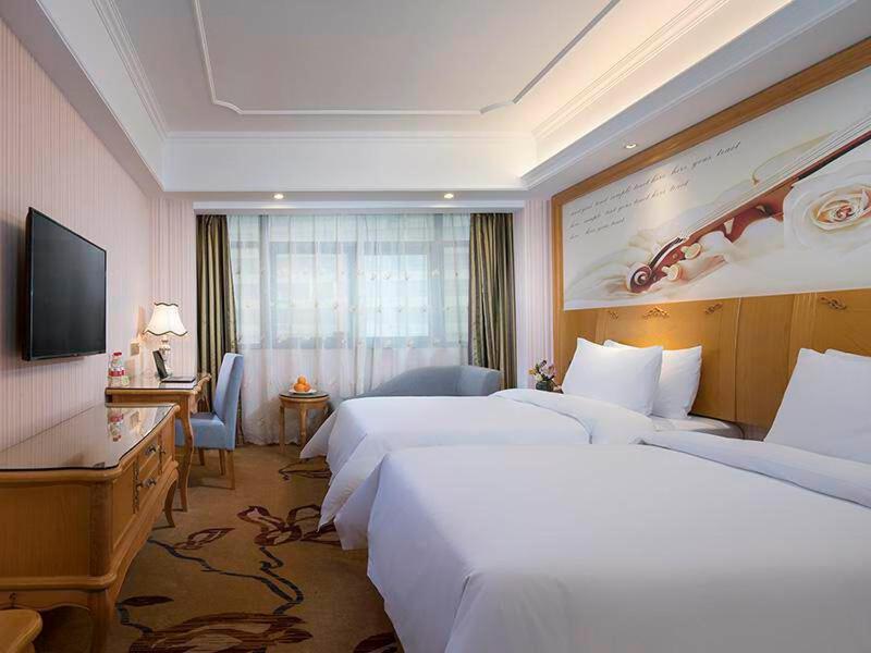 Vienna International Hotel Fenghua Zhongshan Road Buitenkant foto