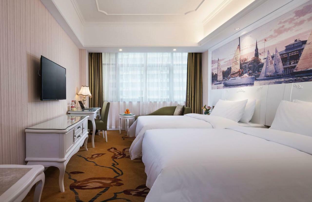Vienna International Hotel Fenghua Zhongshan Road Buitenkant foto